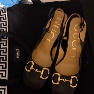 Gucci Black and Gold Heeled Slingbacks